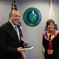 Cheryl Ingstad being sworn in as director of the Energy Departments Artificial Intelligence and Technology Office by Under Secretary for Science Paul Dabbar. 