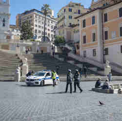 A police car sits at the bottom of Rome's Spanish Steps.