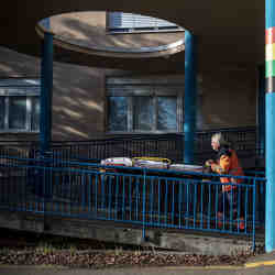 A medical staff member pushes a stretcher at a hospital in the Czech Republic. 