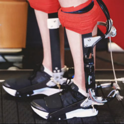 ankle exoskeletons on runner's legs