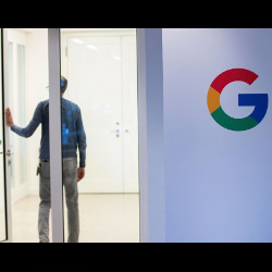 person exiting Google office building