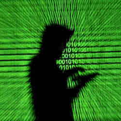 Silhouette of a mobile device user next to a screen projection of binary code.