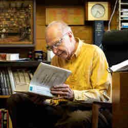 Donald Knuth and his book, The Art of Computer Programming.