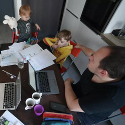 parent with children working from home