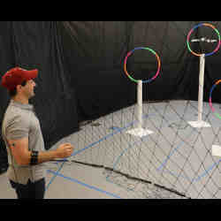 The Massachusetts Institute of Technology's Joseph DelPreto directs a drone through obstacles with muscle movements. 