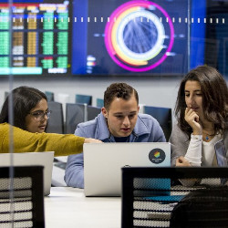 students working at a laptop computer