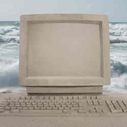 A PC made of sand awaits the next big wave.