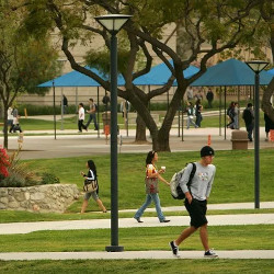 students walking on California State University, Fullerton campus