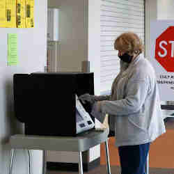 A voter in Warren City Hall in Warren, MI, last week.