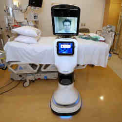 Mercy Telehealth Network medical director Dr. Alan Shatzel using the telepresence RP-VITA robot at Mercy San Juan Hospital in Carmichael, CA. 