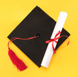 graduation cap and diploma