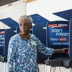 A woman uses a voting machine during the South Carolina Democratic primary in 2016.