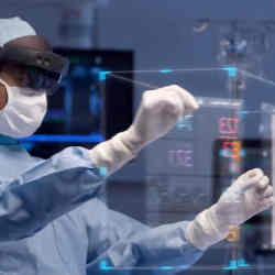 A doctor using HoloLens 2 Augmented Reality in the operating room.