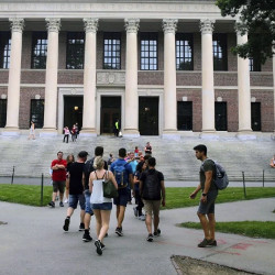 students in front of Harvard's Widener Library