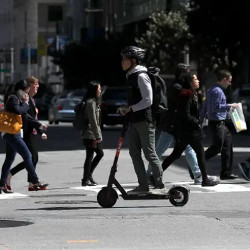 worker on scooter in San Francisco