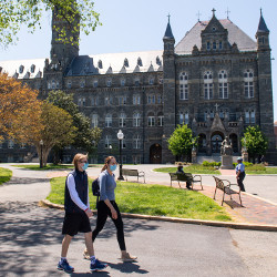 students on campus in masks