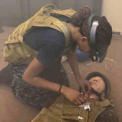 A first responder receives instructions from a surgeon through an augmented reality headset to perform an operation. 