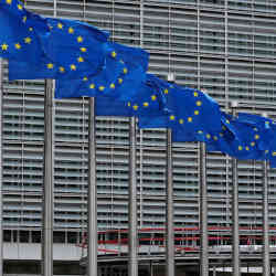  European Union flags flutter outside the European Commission headquarters in Brussels, Belgium.