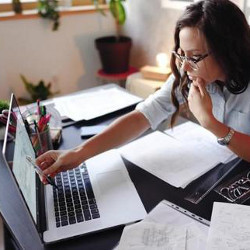 female worker at laptop computer