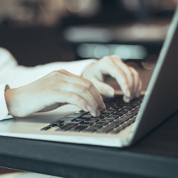 female hands on keyboard