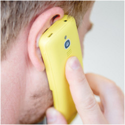 man holding mobile phone to ear