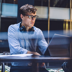 worker at standing desk