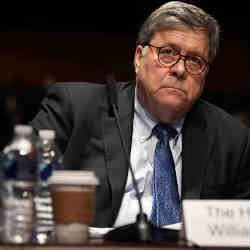 U.S. Attorney General William Barr appearing before the House Oversight Committee this summer. 