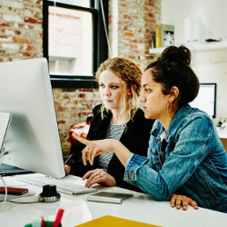 two women at a computer