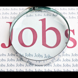 the word 'Jobs' under magnifying glass