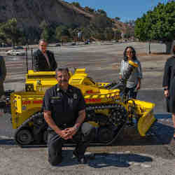 Members of the Los Angeles Fire Department with their new robot.