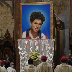 portrait of Carlo Acutis unveiled during beatification ceremony