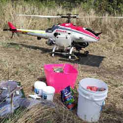 A drone being prepared for seeding.