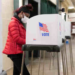 A voter casting a ballot.