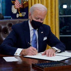 President Biden signing an executive order