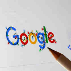 Doodling on the Google logo.