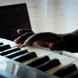 Learning to play the piano.