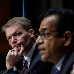 Kevin Mandia of FireEye and Sudhakar Ramakrishna of SolarWinds at an intelligence hearing Tuesday.