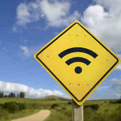 A broadband sign in a rural setting.