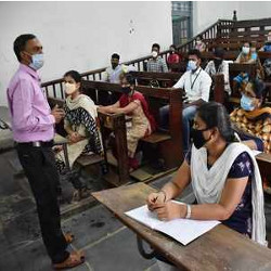 lecturer and students in classroom in India