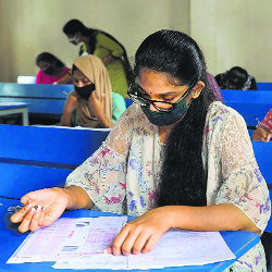 female student in classroom in India