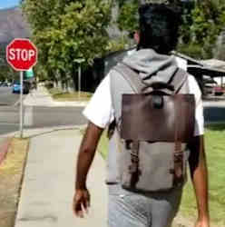 A test subject wears the backpack.