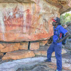 Examining ancient rock art. 