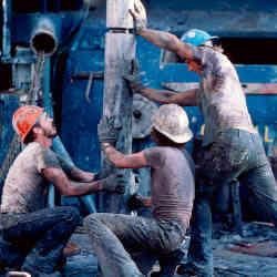 Human workers on an oil rig.