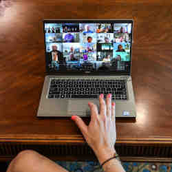 Members of a retirement community take part in a virtual birthday party celebration.