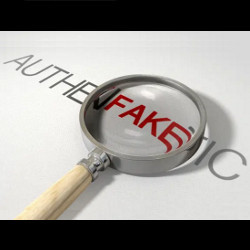 words 'authentic' and 'fake' under magnifying glass, illustration