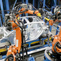 A Ford auto assembly line, manned by robots. 