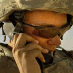 A soldier on his cellphone.