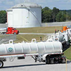 Trucks line up at a Colonial Pipeline facility in Pelham, AL.