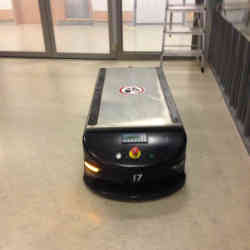 This robot transports trolleys around the hospital. 