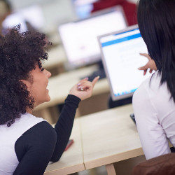 female students at computer